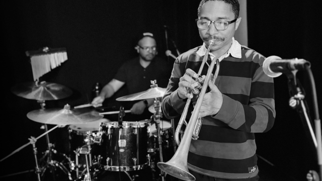 Yellowroot cast playing trumpet and drums