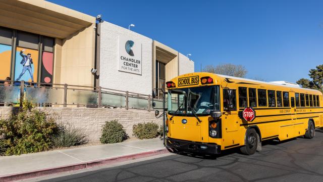 School bus parked outside of CCA box office