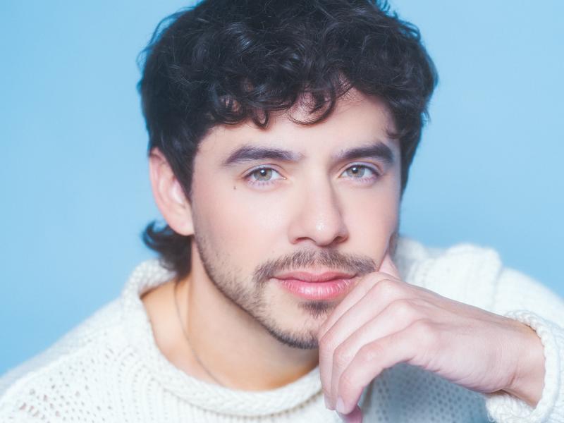 David Archuleta in a white sweater