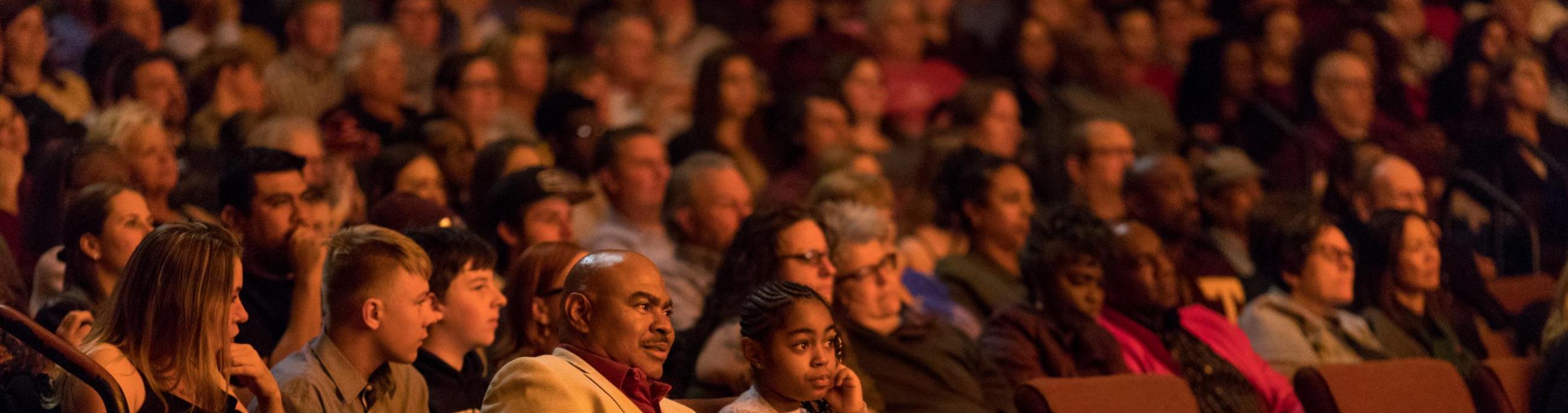 Crowd watches a CCA performance