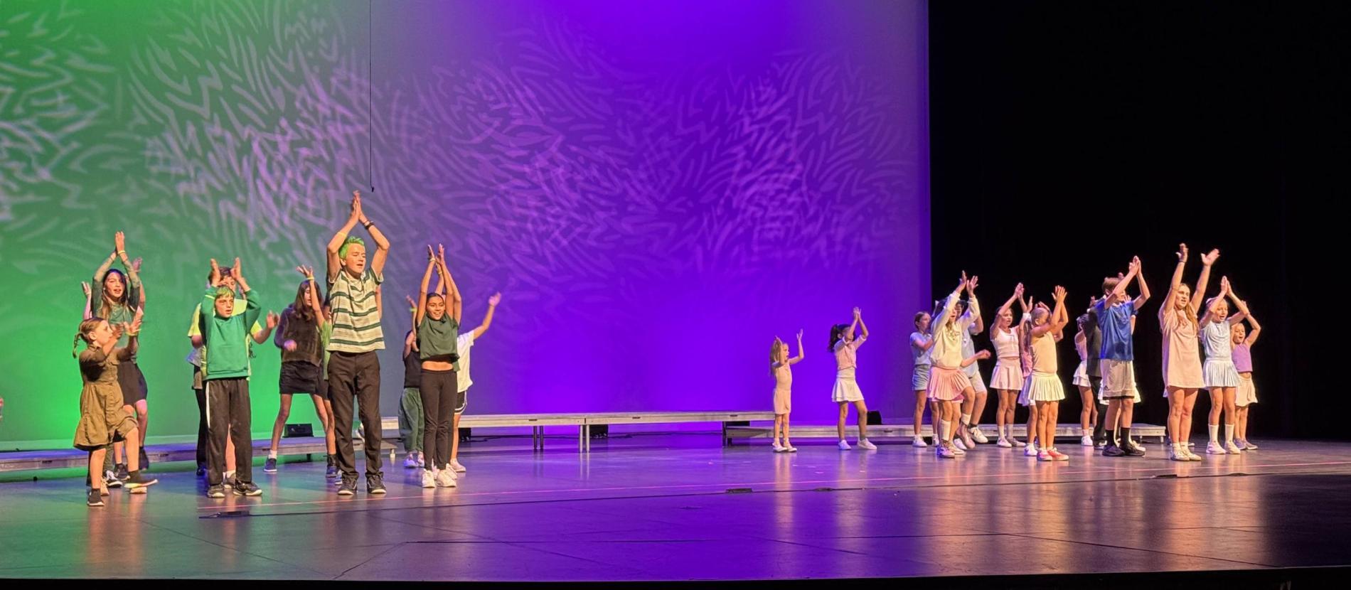 Camp kids performing Hamilzombies on the Mainstage Summer 2025