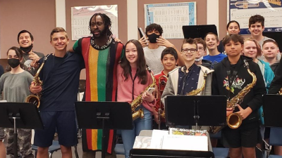 Artist in Residence, Michael Mwenso, with the Willis High School Jazz Band